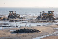 Bagger werkzaamheden op Texel.