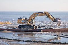 Bagger werkzaamheden op Texel.