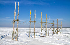 Palen steiger van SIl in de winter.