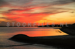 Zonsondergang bij de Mokbaai.